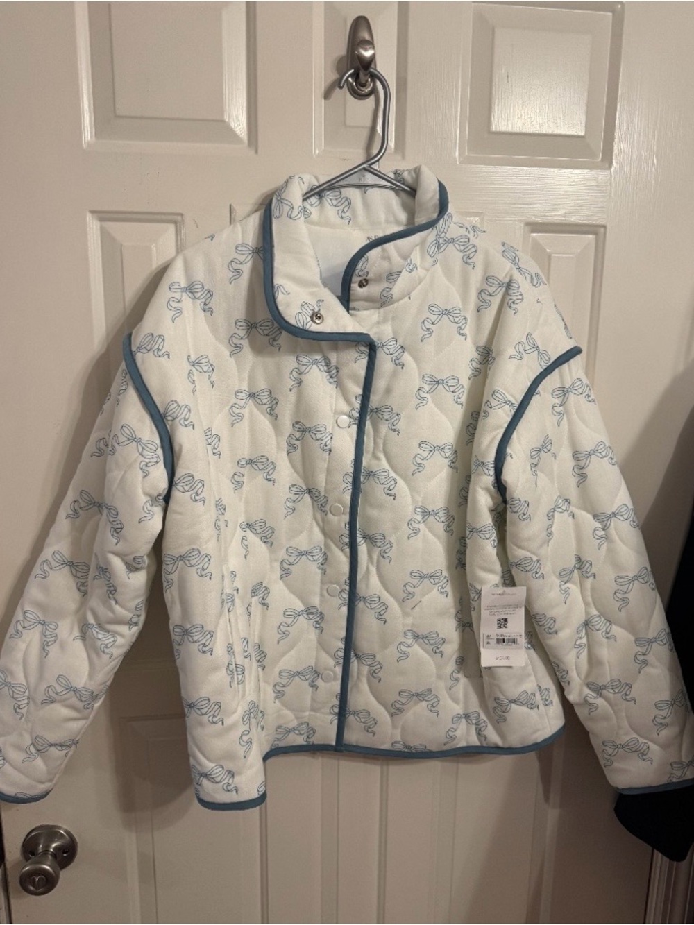Quilted White Jacket with Blue Bow Print
